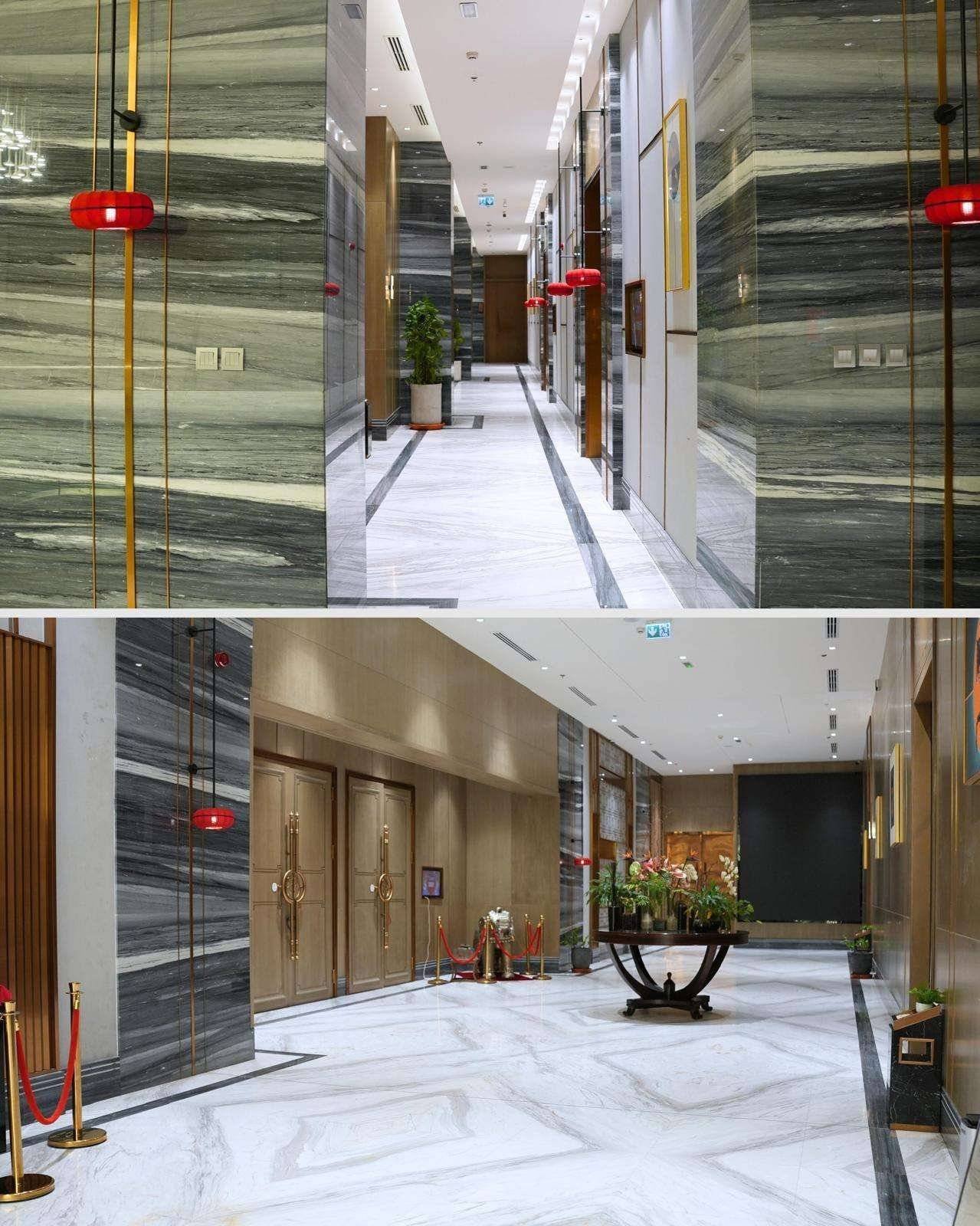 Modern hotel hallway and lobby with marble